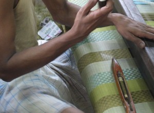 Weaving an intricate, elegant scarf for Sevya’s retail and wholesale scarves collection.