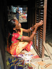 Artisan in India Preparing Loom for Fair Trade Hand-Woven Scarves